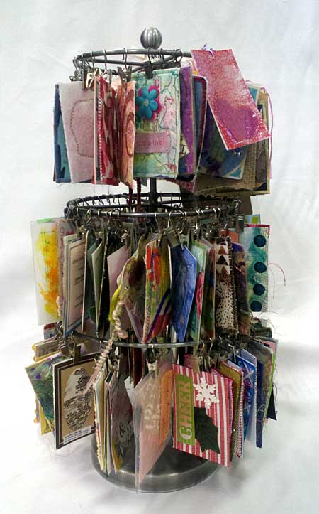 Display carousel of ATCs collected by Judy Gula of Artistic Artifacts