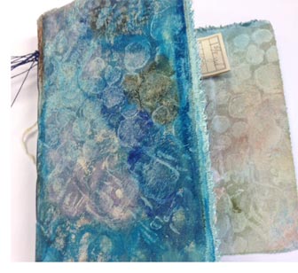 Textured canvas journal made by Judy Gula in a class led by Leighanna Light.