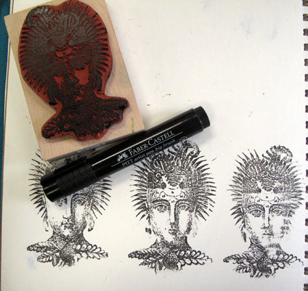 Using a Pitt Big Brush pen to color a rubber stamp