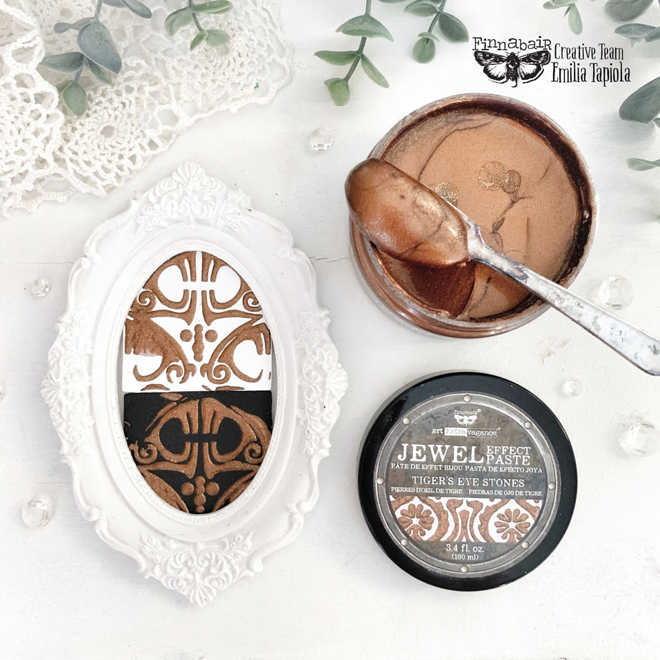 Oval frame, jar of paste, spoon, and Jewel Effect paste.