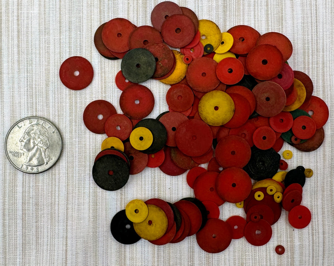 Trade Beads, French Plastic. round disc with center hole. Assorted sizes and colors