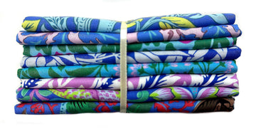 Stack of folded floral fabric.