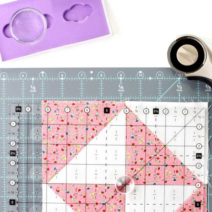 TGQ030 rotary cutter and quilting tools in use