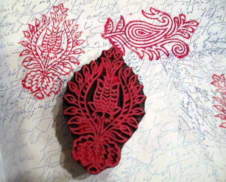 Another paisley block stamped in shades of red