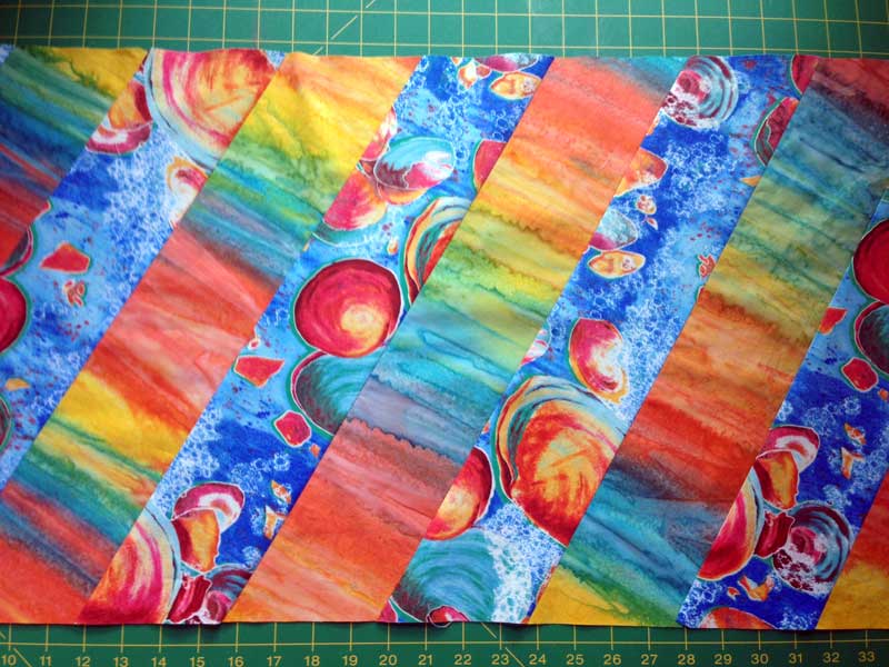 Christine Vinh begins piecing a table runner , inspired by a Kaffe Fassett project