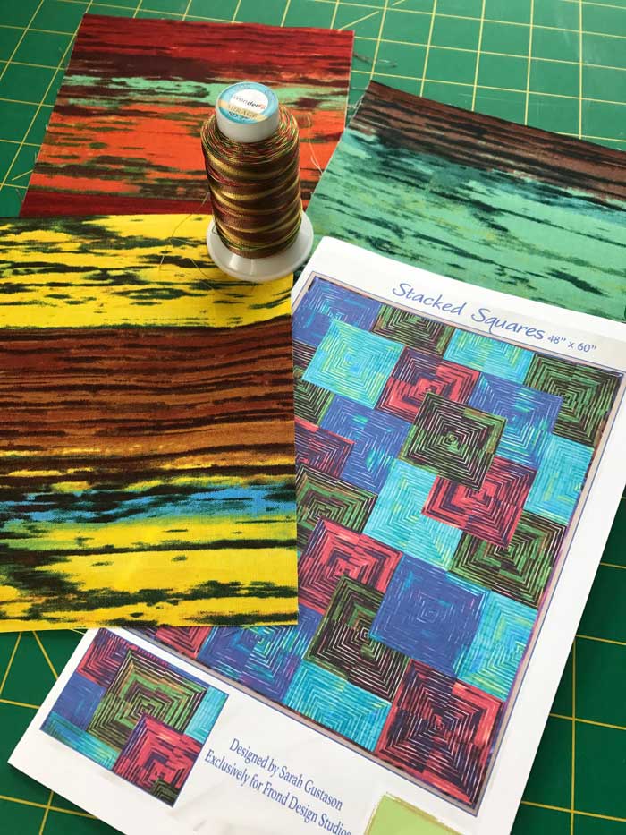 Materials to create a Stacked Squares art quilt