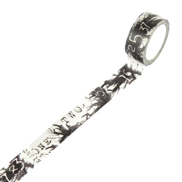 Black and white decorative tape roll.