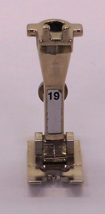 Sewing machine foot with number 19.