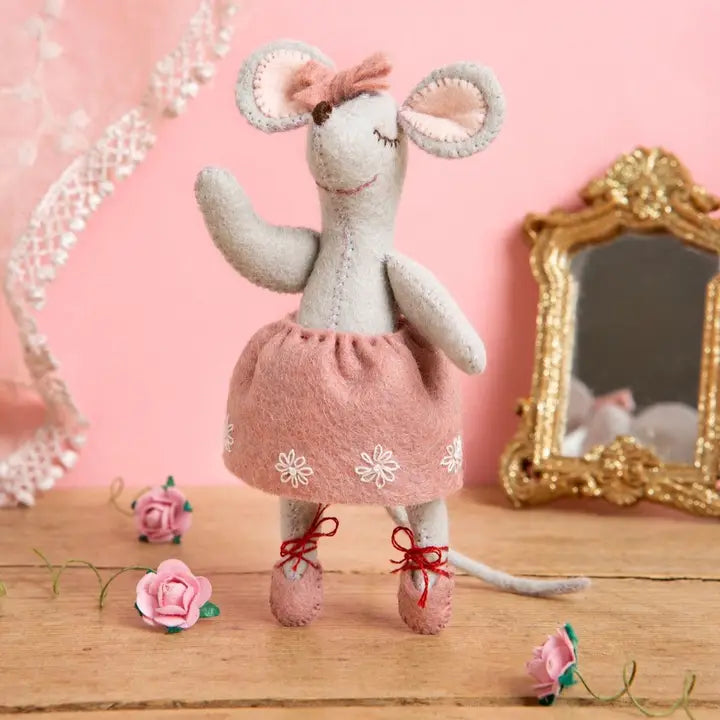 Stuffed mouse ballerina in pink tutu and ballet shoes.