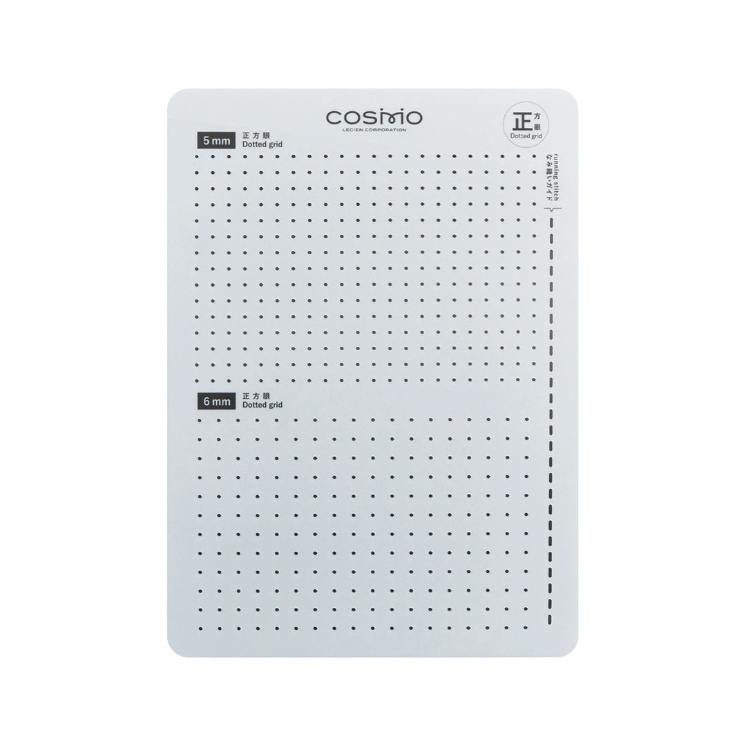 White grid sheet with dotted lines and text.
