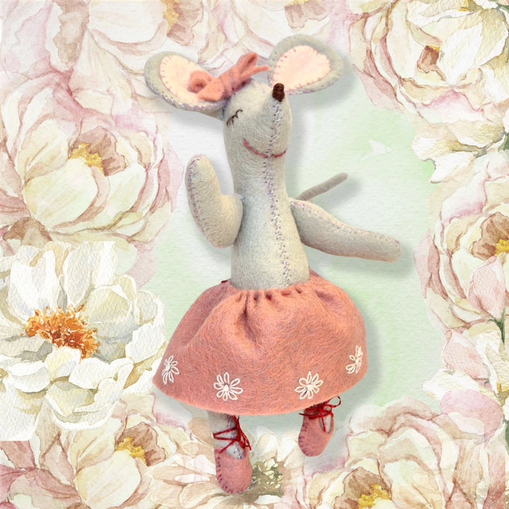 Ballerina mouse toy in a floral setting
