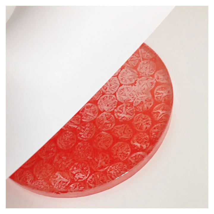 Red textured half-circle design