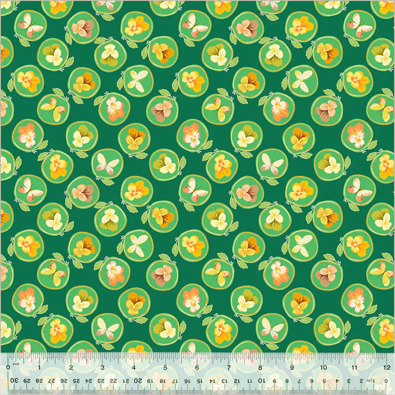 Fabric pattern with green background and floral design.