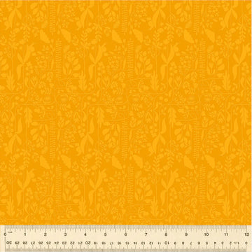 Yellow floral fabric swatch with ruler.