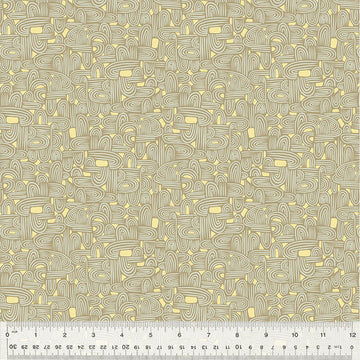 Fabric pattern with tan and yellow abstract design, ruler visible.