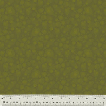 Green textured fabric with ruler