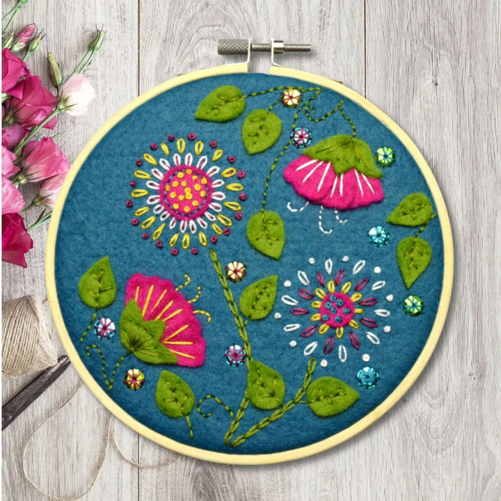 Embroidered floral design in a hoop.