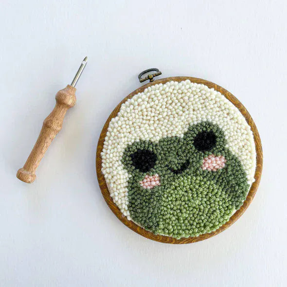 Punch needle frog art with wooden hoop and tool