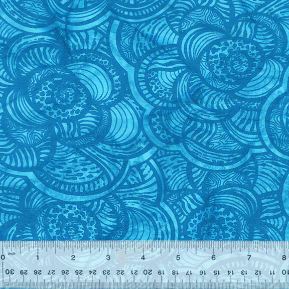 Blue fabric with swirl pattern, 9209Q-10-1-015Ud000004Y43jIAC, and ruler.