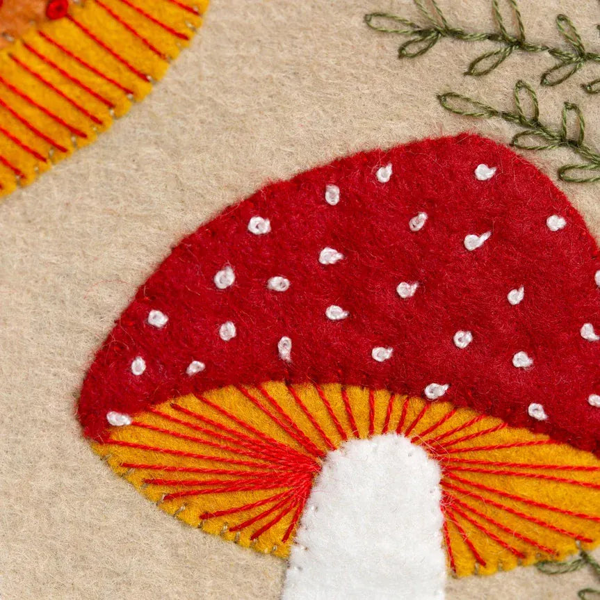 Red mushroom with white spots, felt craft.