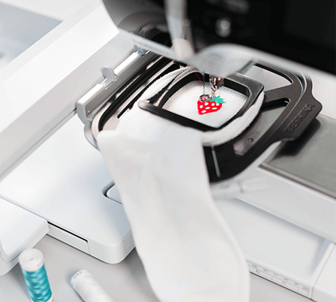 Bernina Sock Hoop insert accessory sewing a strawberry design