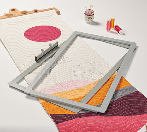 Bernina magnetic embroidery frame with fabric and accessories.