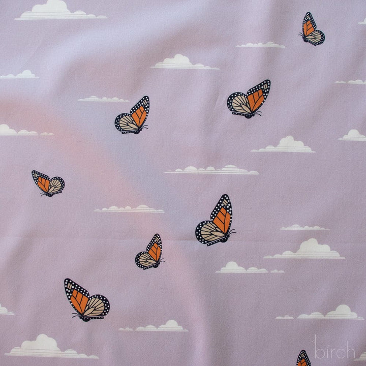 Butterflies and clouds pattern