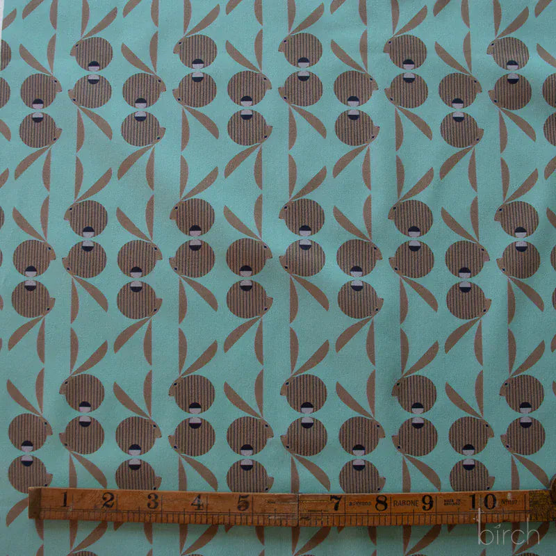 Charley Harper Canyon Country fabric pattern with brown and teal elements