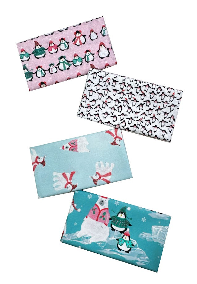Spread of penguin and bear-themed gift wrap.