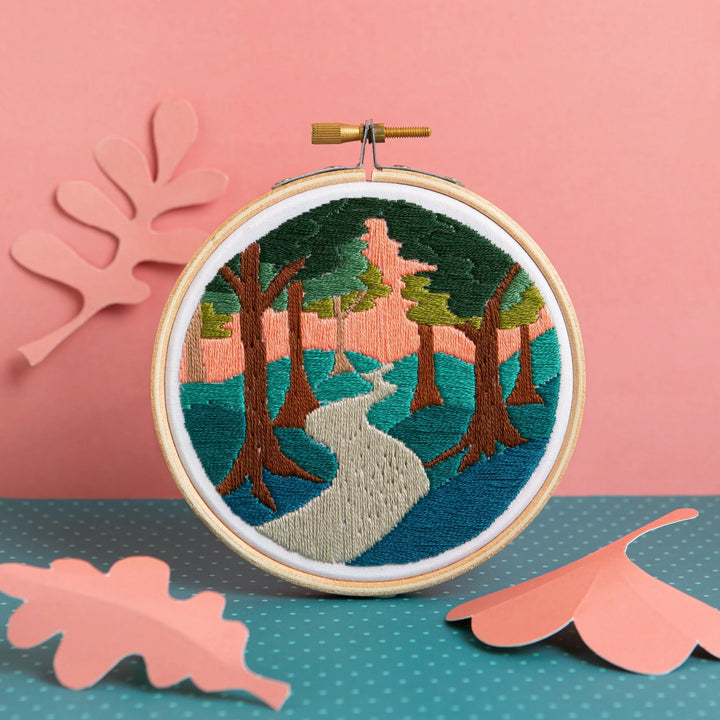 Mini embroidery kit of a forest walk scene