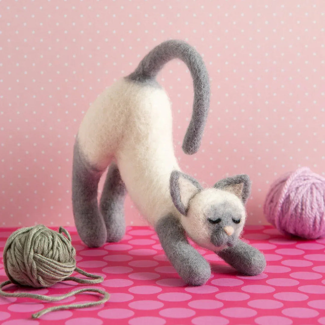 Needle felted stretching cat with yarn