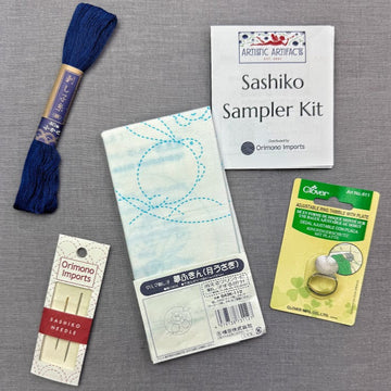 thread, needles, fabric, and sampler kit.