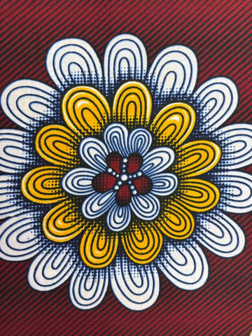 Colorful flower pattern on red background.