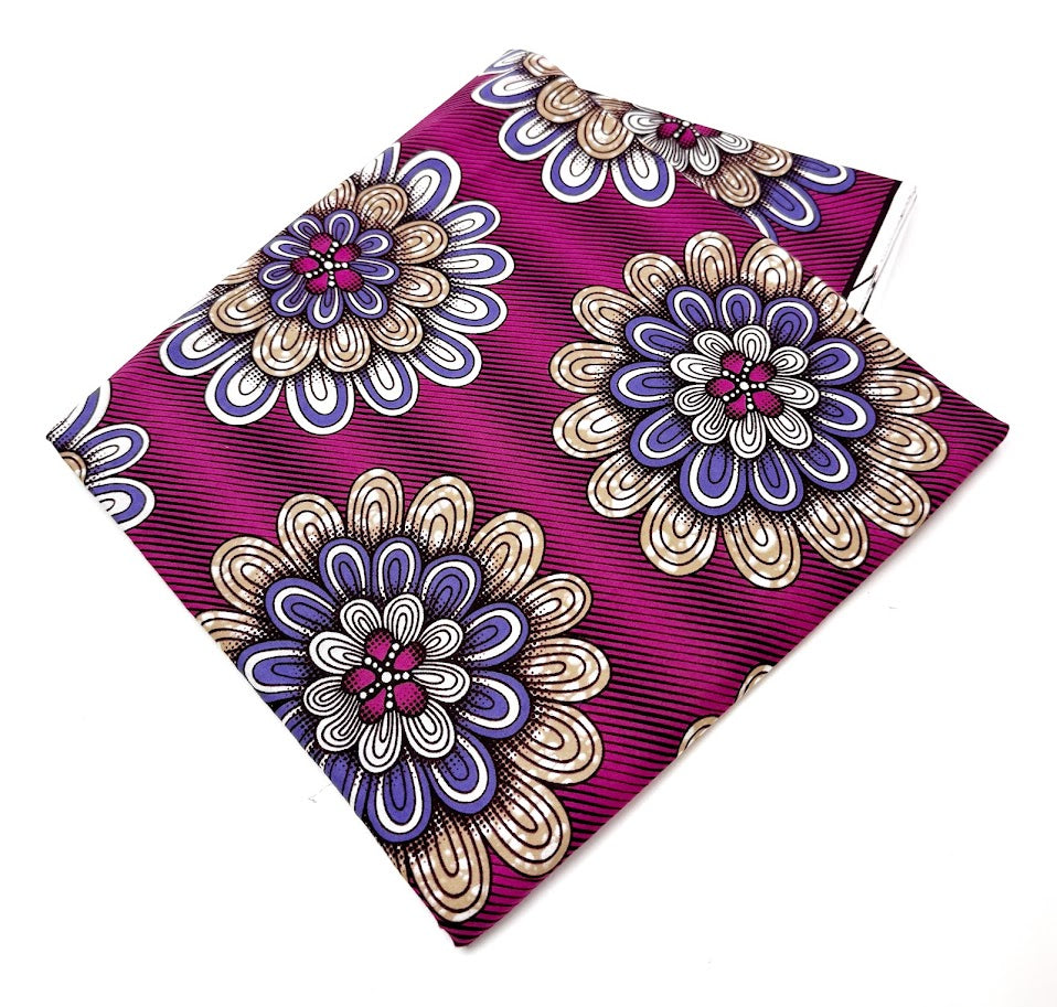 Folded purple floral fabric.