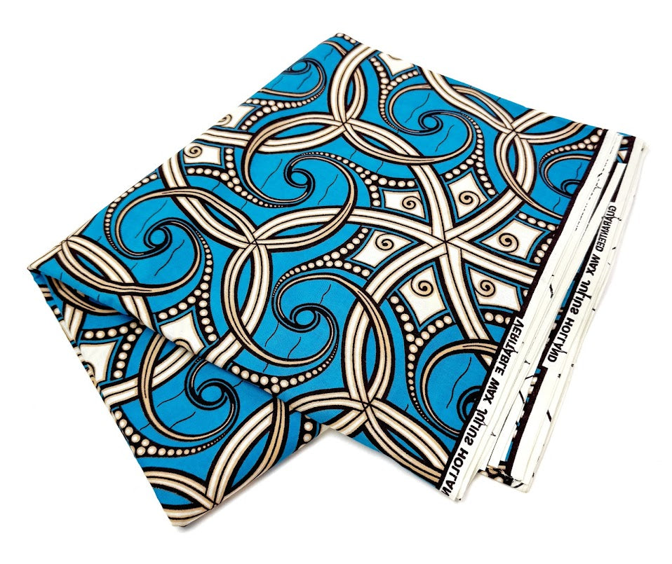 Folded blue patterned fabric.