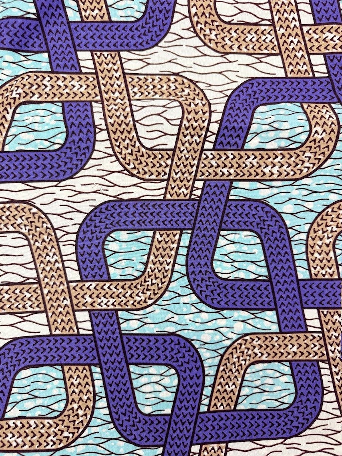 Geometric pattern of woven purple and tan shapes.