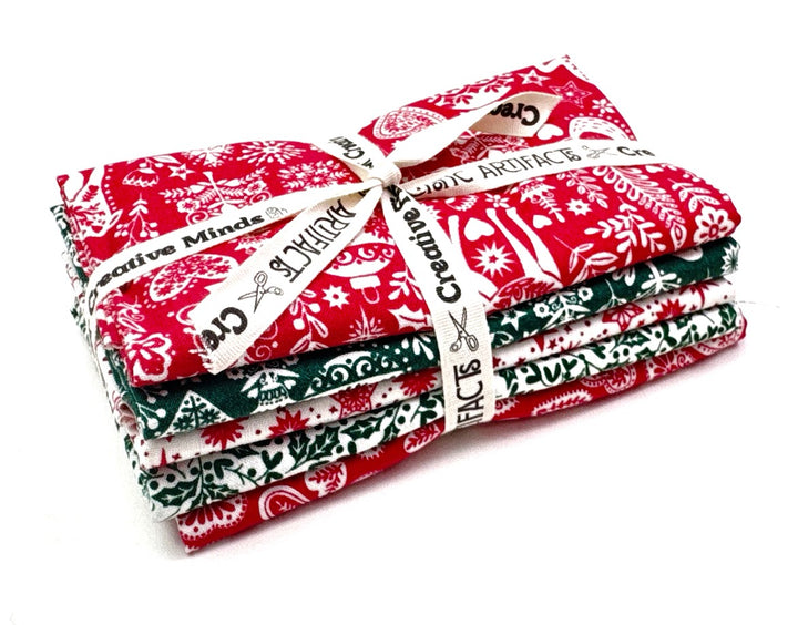 Fabric bundle with red and green Christmas patterns
