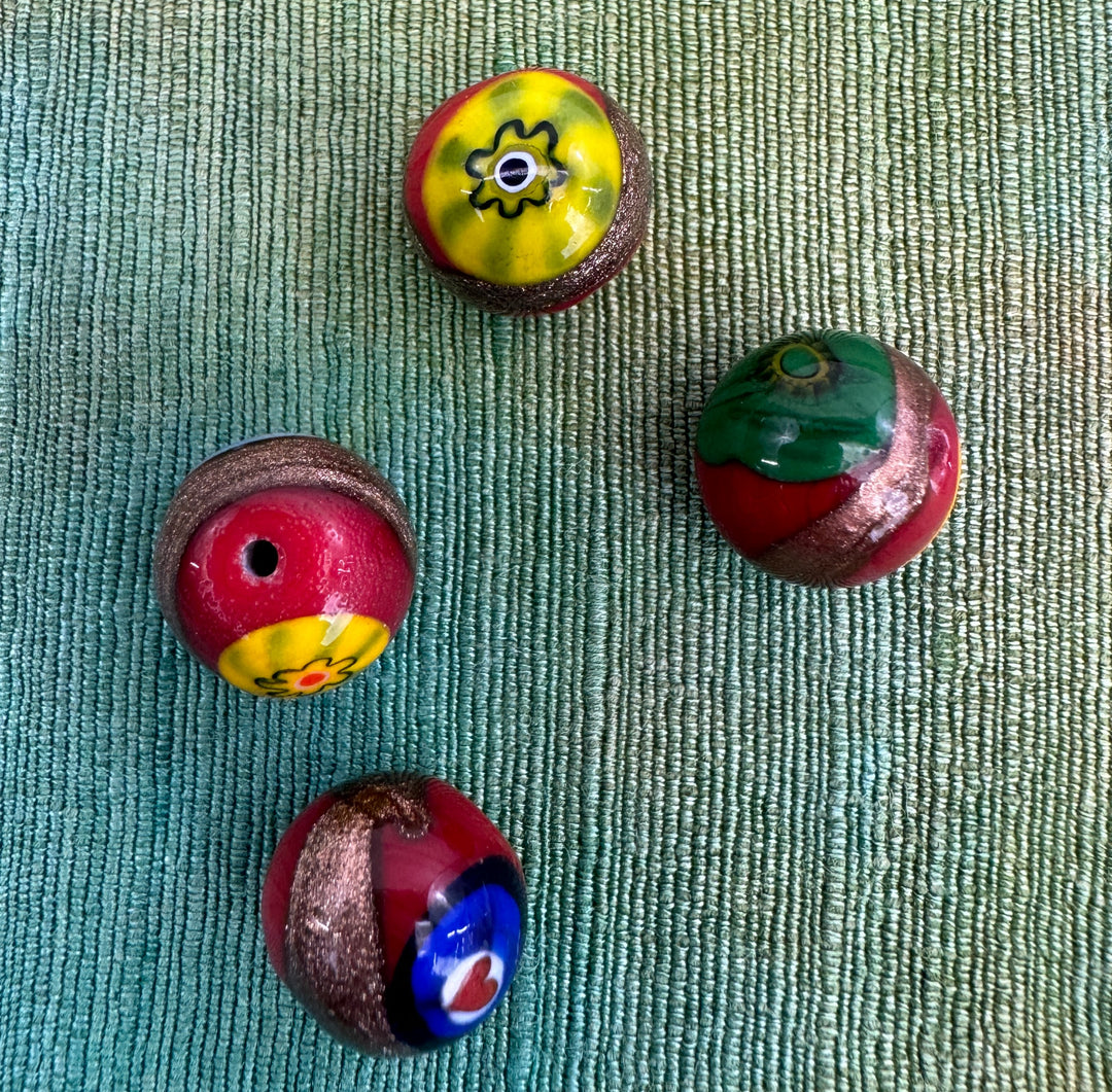 Glass beads with red base