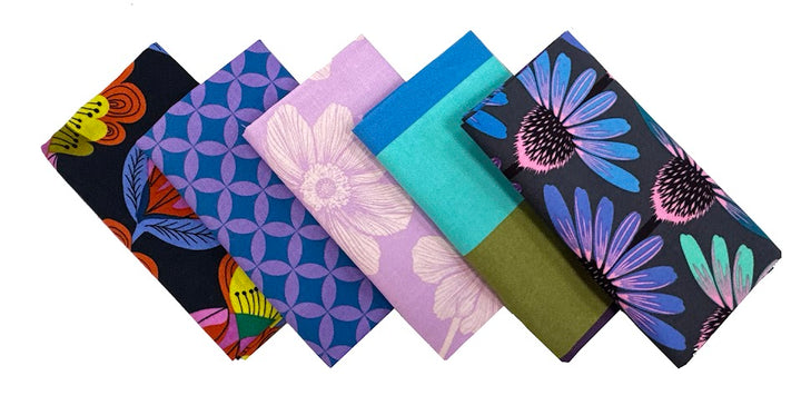Six colorful fabric squares with floral and geometric patterns.