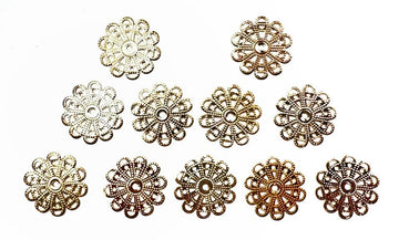 Ten small, decorative, gold-colored flower-shaped embellishments.