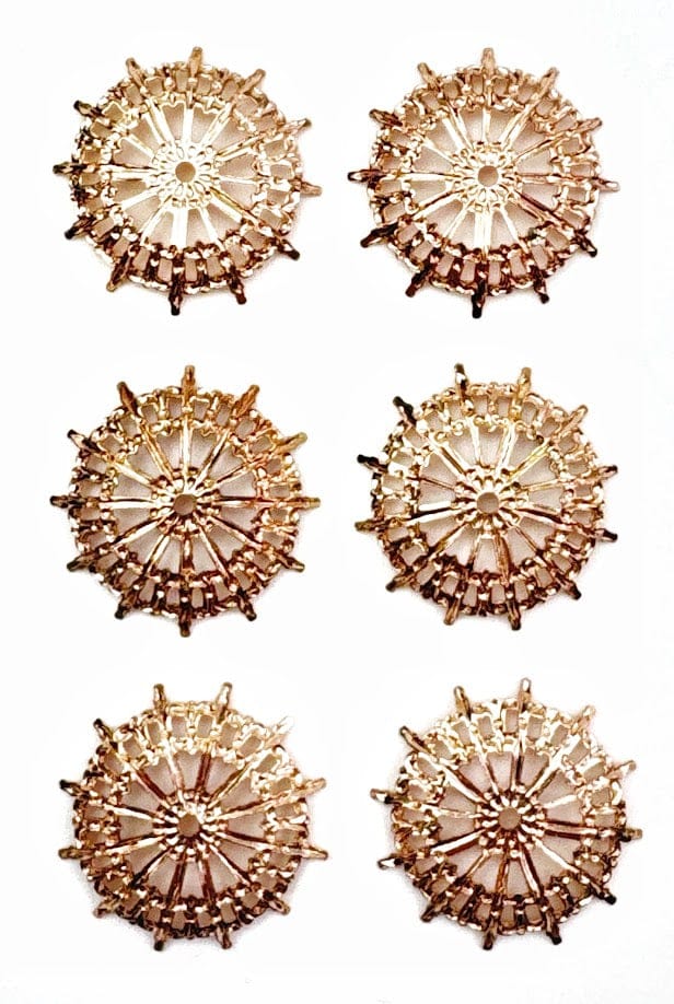 Six gold, starburst-shaped decorative elements.