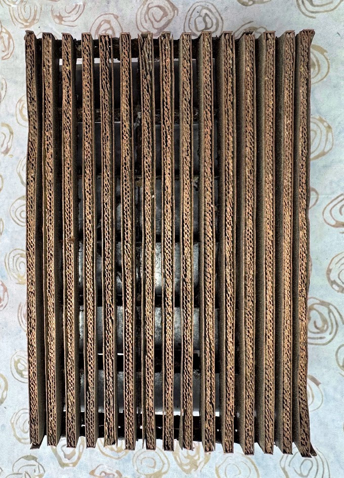 Decorative Copper Tjap with braided design straight lines
