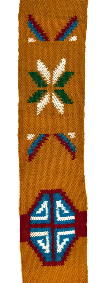 Woven textile with geometric patterns in various colors.