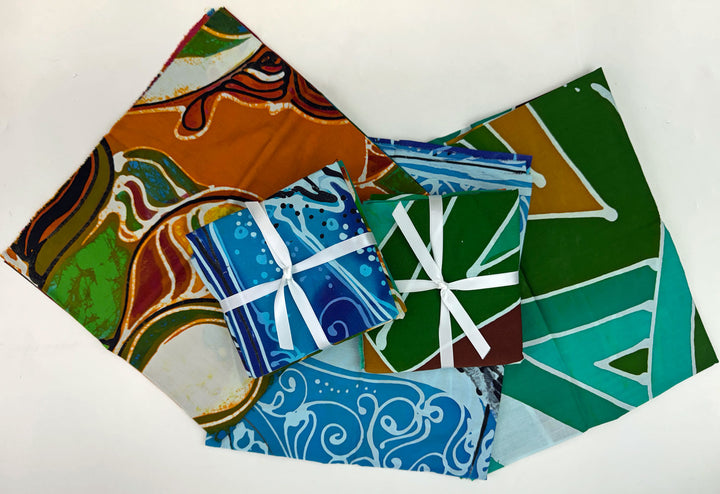 Fabric squares and wrapped gifts with patterned designs.