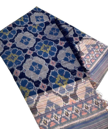 Traditional Handwoven Ikat Fabric from Indonesia, Flower Motif Sold per 1/2 Yard Traditional Handwoven Ikat Fabric from Indonesia, Flower Motif Sold per 1/2 Yard