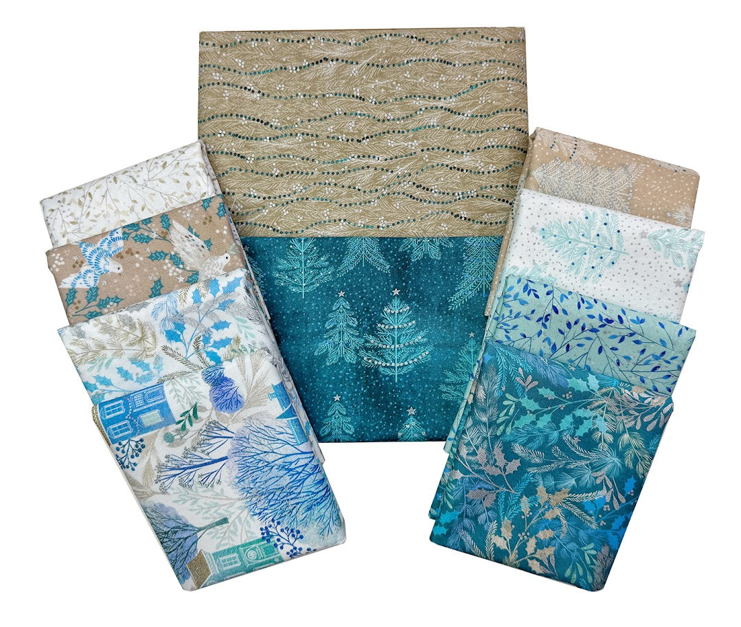 PeacefulQuiltKit fabric bundle with winter-themed patterns