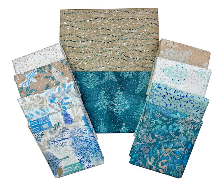 PeacefulQuiltKit fabric bundle with winter-themed patterns