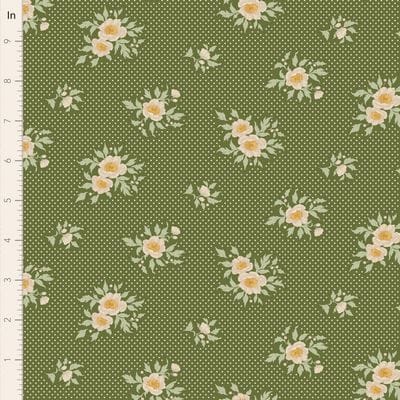 Green floral fabric with polka dots.