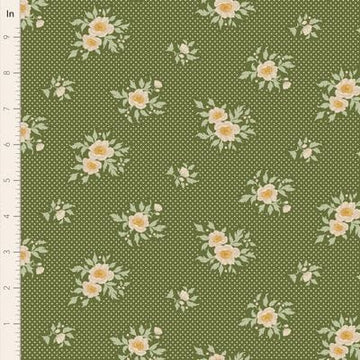 Green floral fabric with polka dots.