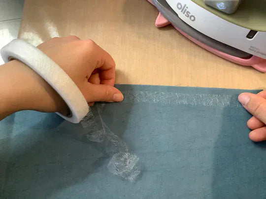 Half-inch bangle being made, fabric and iron in use